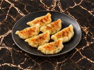 KI-generiertes Beispielbild: Gyoza